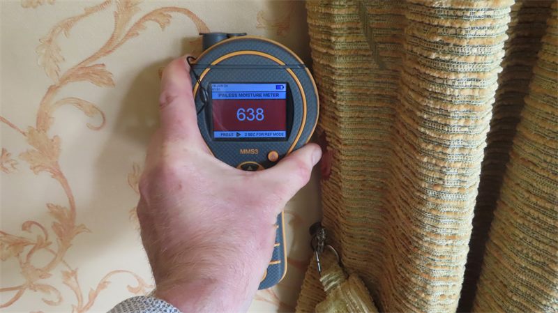 Moisture meter reading taken during a damp survey