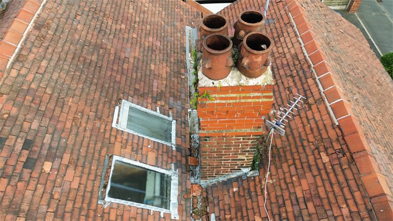 Close view of residential roof coverings during a roof inspection