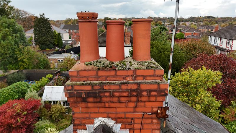 Close aerial inspection of a chimney stack