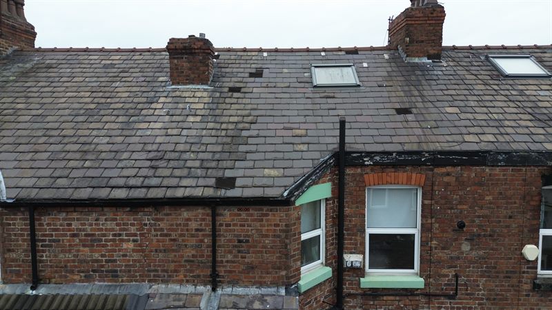 Slate roof inspected from the air