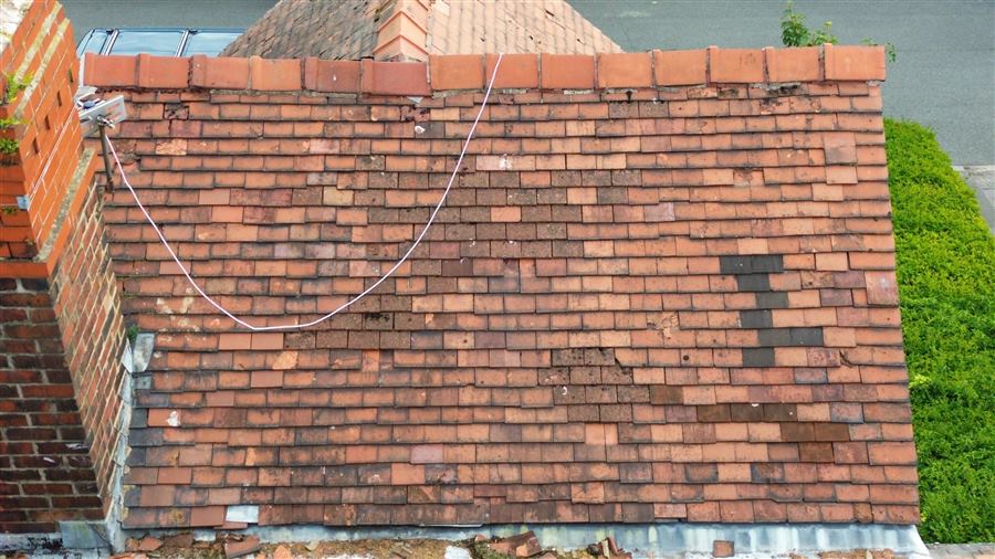 Weathered tiled roof coverings